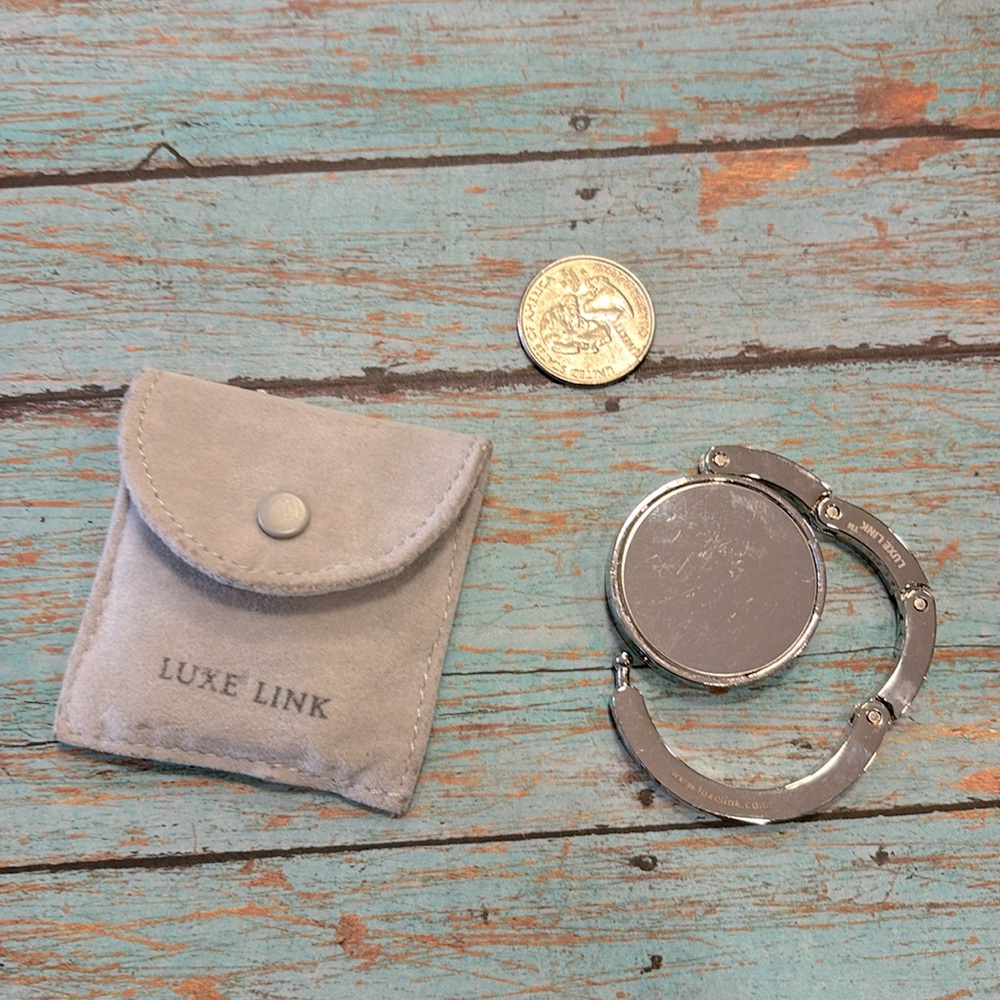 Clever purse hook for attaching purse to a table top while out on the town!